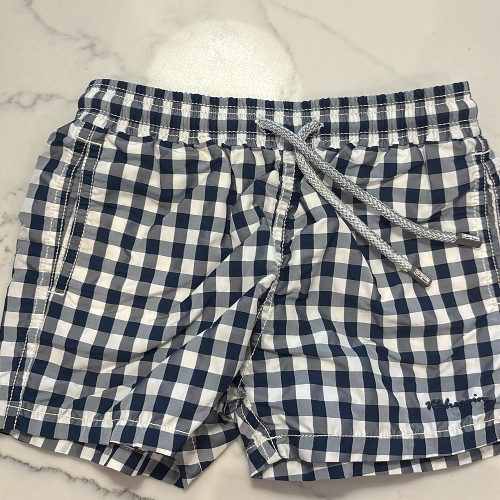 Gently worn Vilebrequin boys swim trunks size 6!  Navy and white checkered